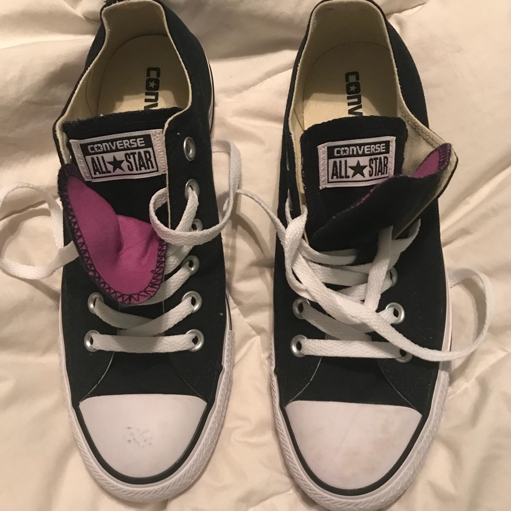 Black Converse low tops with purple tongue